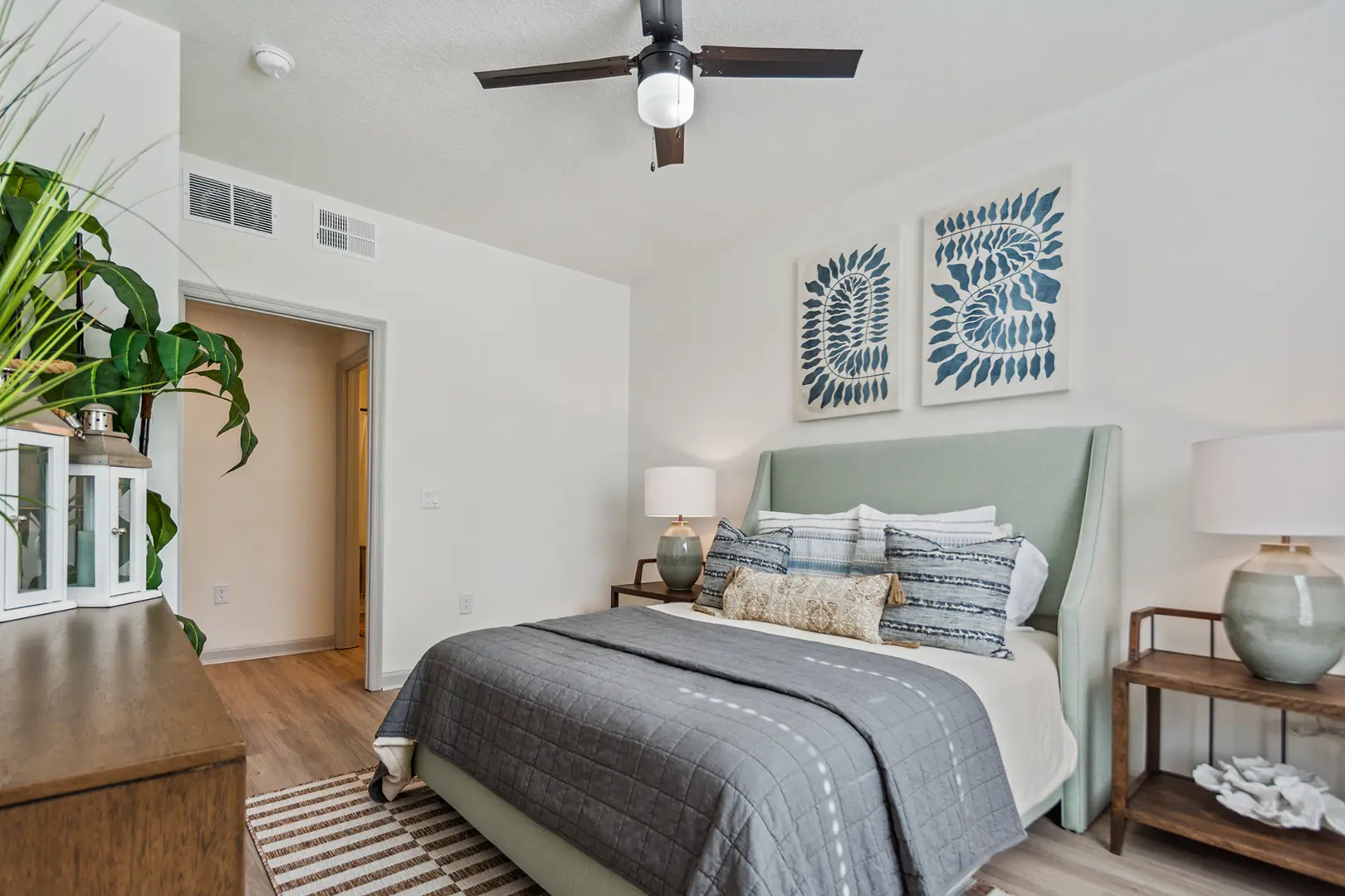 Bedroom with queen bed and two side tables