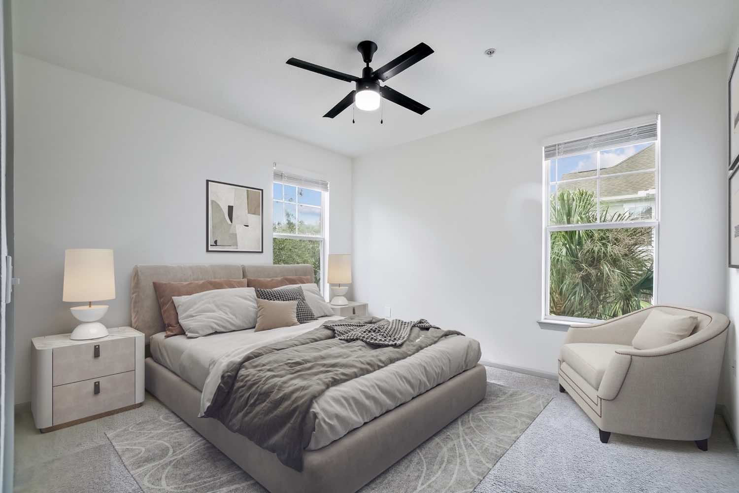 bedroom with plush carpeting and ceiling fan