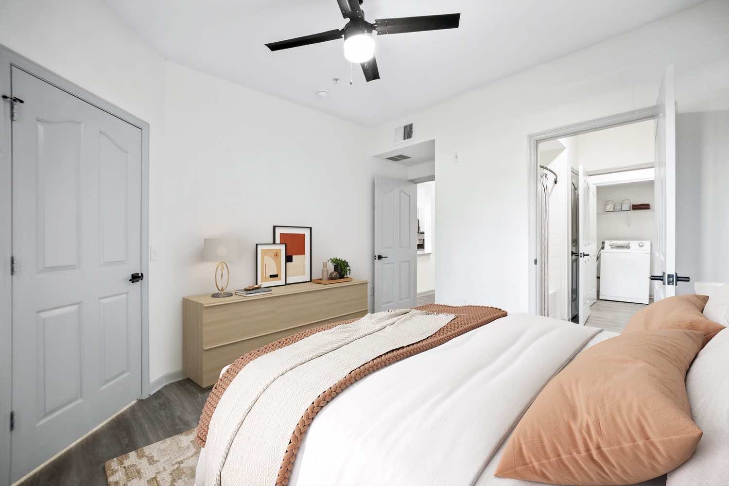 bedroom with wood-style flooring and ceiling fan